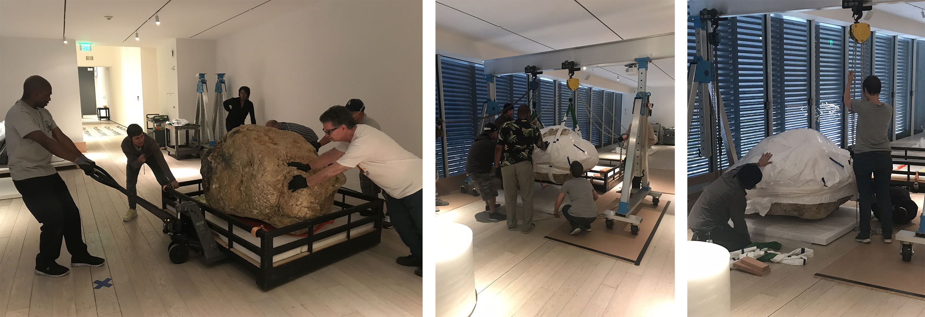 Preparators installing the two stones in Zhan Wang’s Gold Mountain