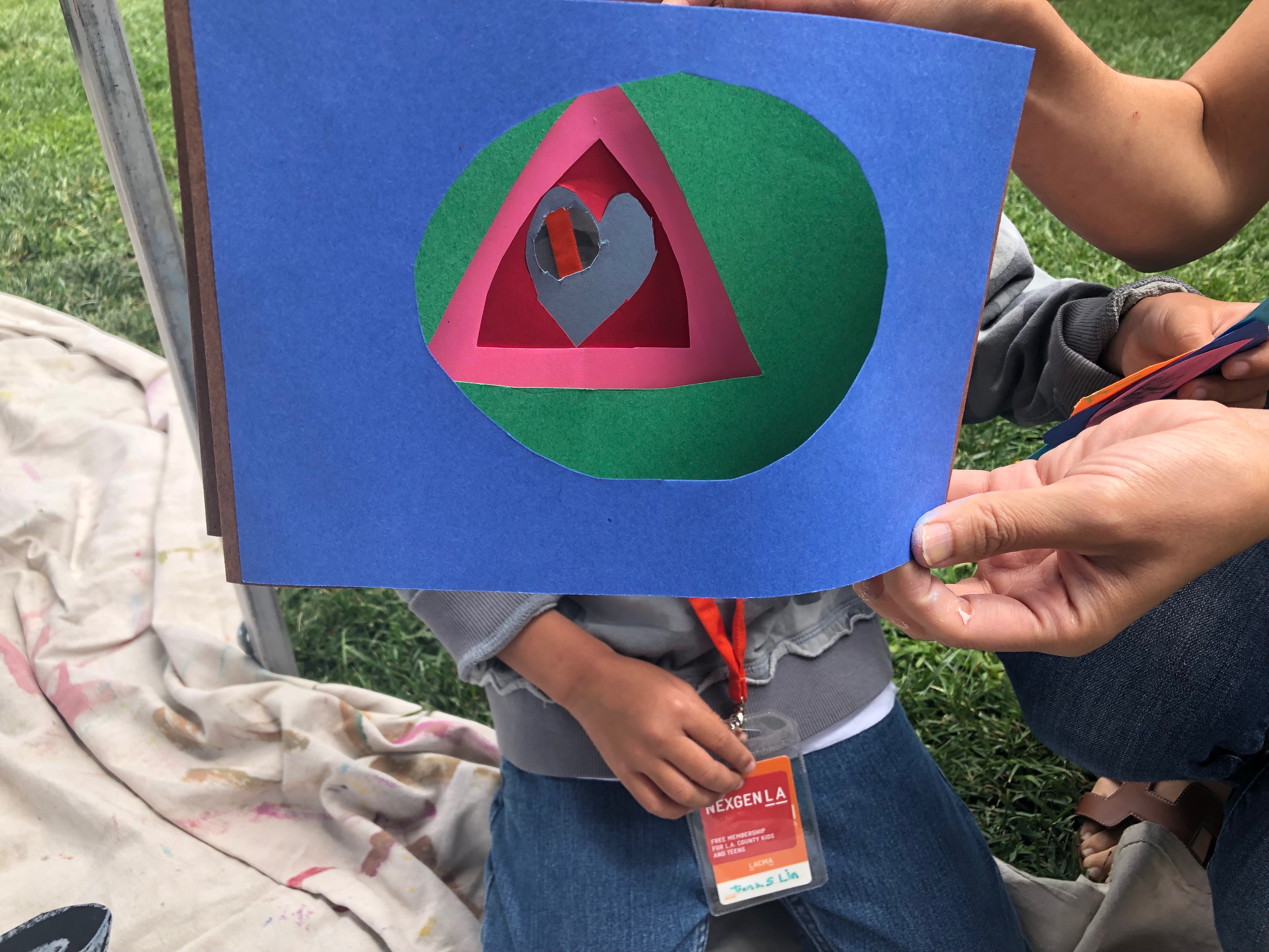 Young artist making a tunnel book in Elonda Norris's art workshop