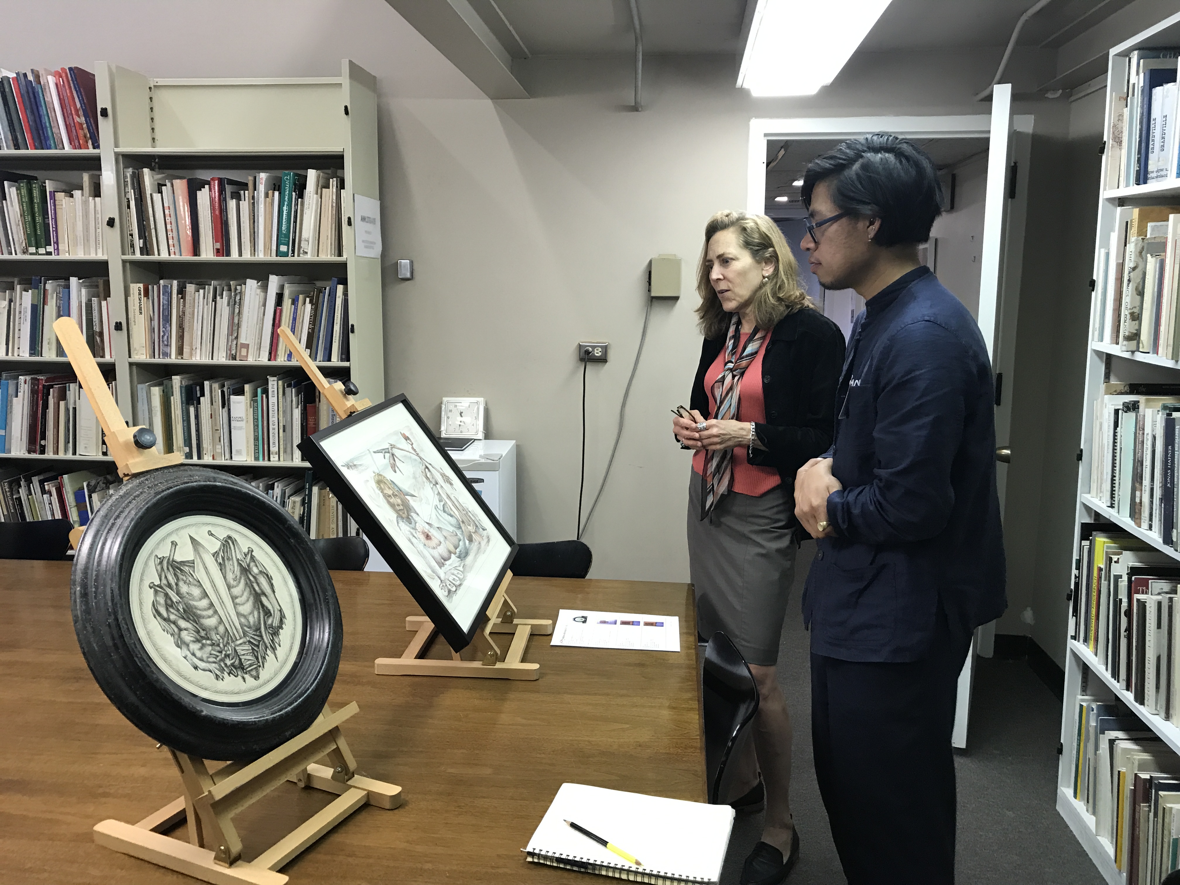 Matthew viewing work by Alfonso Ossorio in Prints & Drawings with Curator Leslie Jones, photo courtesy of Hilary Walter