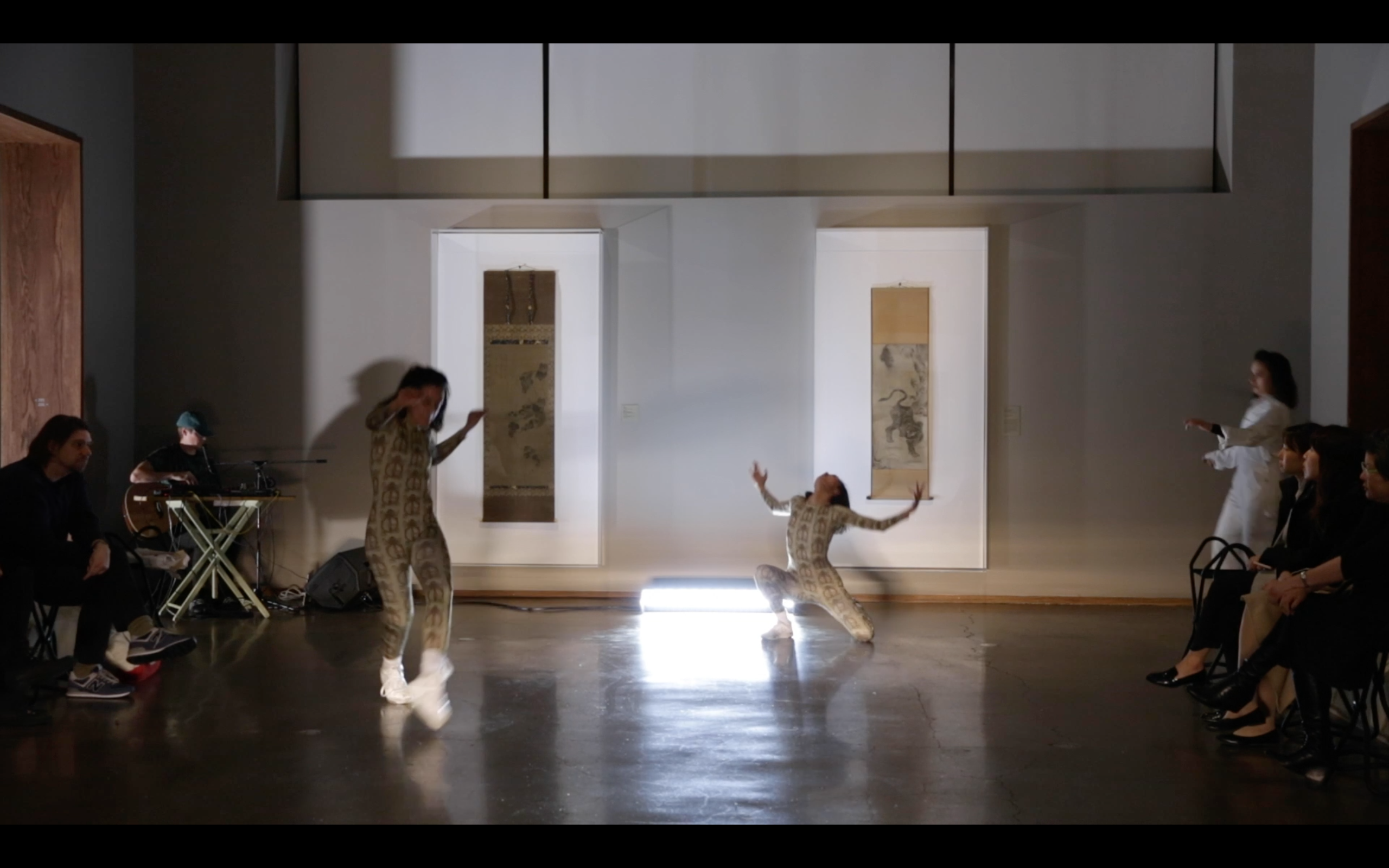 Jennie MaryTai Liu, devika wickremesinghe, Hannah Heller, and Andrew Gilbert performing Living Female Respondent or 53 Yakshi in LACMA’s Korean Art galleries, photo by Ian Byers-Gamber