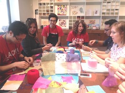 Boone Children's Gallery staff and collaborators working on the community bojagi