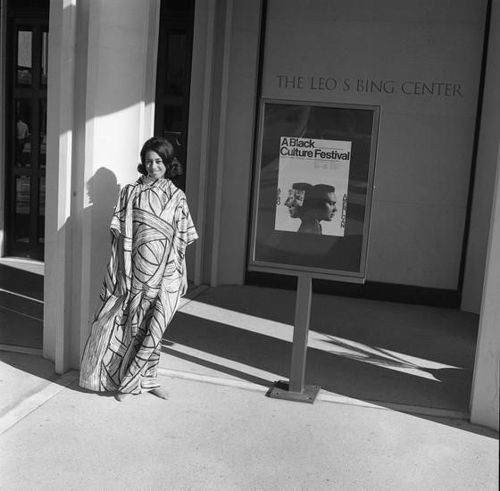 A model poses for a photo at A Black Culture Festival (1968) at LACMA wearing African-inspired designs