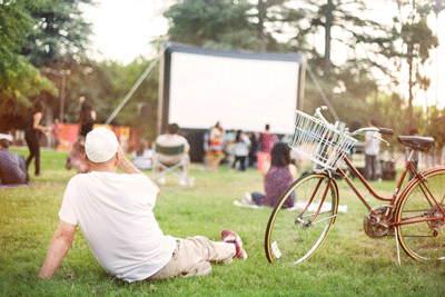 A man awaits the start of a film at San Bernardino Art + Film Lab. Photo by Duncan Cheng. 