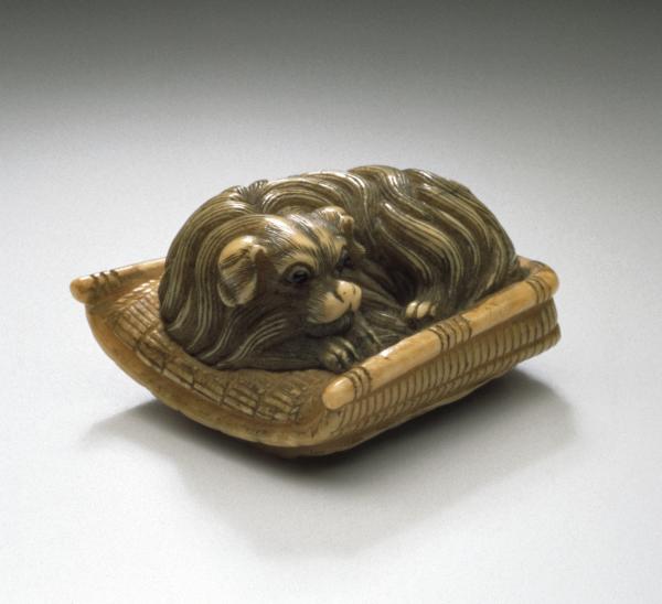 Attributed to Garaku School, Dog Sitting in Padded Basket, Japan, late 18th-early 19th century