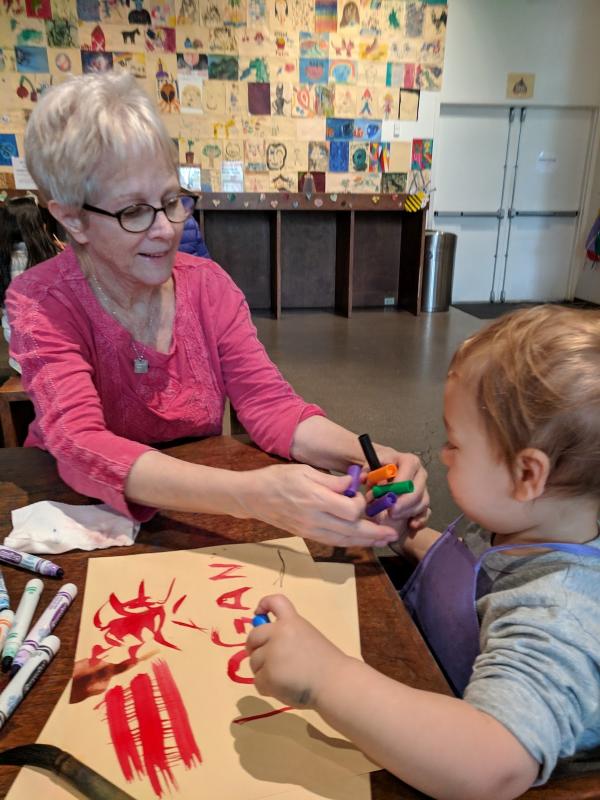 Tracy Newman and grandson Logan in the Boone Children's Gallery, photo credit: Liza Cranis