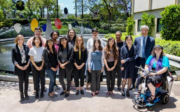 Mellon Academy participants standing in front of Calder sculpture with LACMA Director Michael Govan