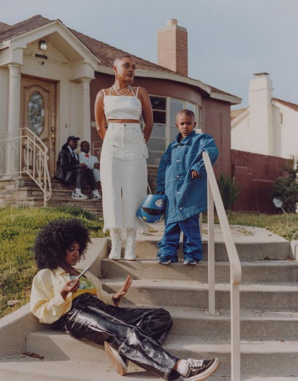 Photo of family on steps in front of house