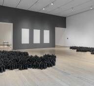 Installation photograph, featuring Liu Jianhua's Black Flame (2016–17) and Blank Paper (2009–12), in the exhibition The Allure of Matter: Material Art from China, at the Los Angeles County Museum of Art