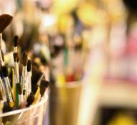 Image of paintbrushes in cups