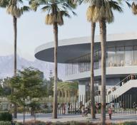 Rendering of museum building exterior, with tall palm trees and visitors